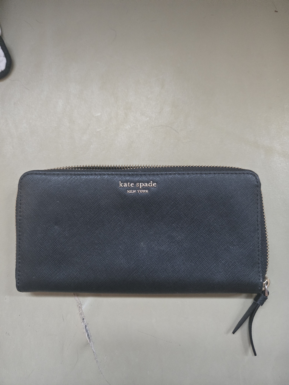 kate spade Black Saffiano Zip Around Wallet with Gold Logo